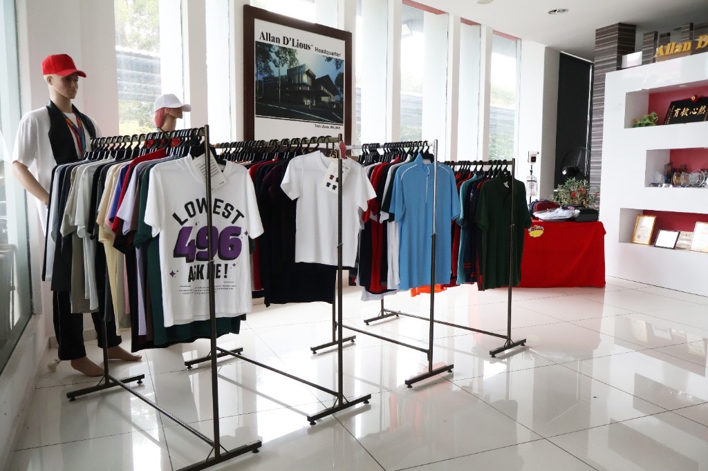 Allan D'Lious showroom in Melaka with uniforms, trophies and headquarters display
